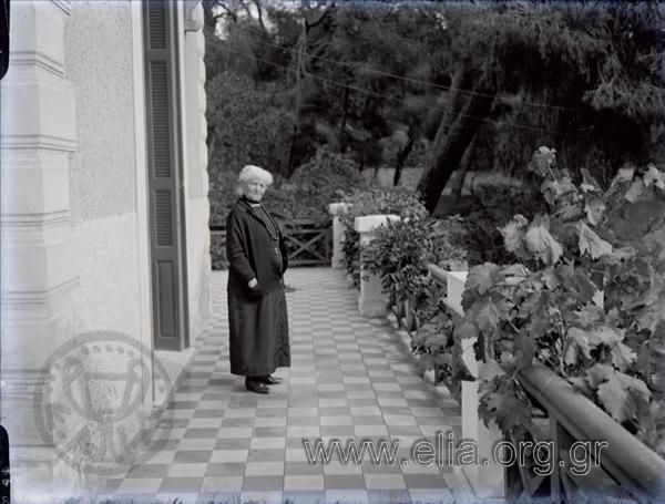 An old woman on the veranda of the residence of the Georgantas family.