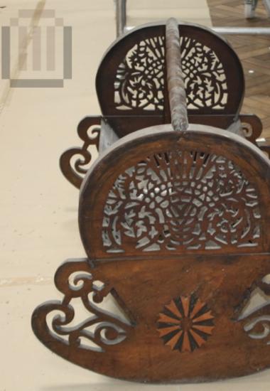 Wooden carved cradle