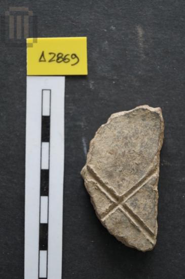 Part of a round sherd disk