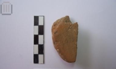 Fragment of a round sherd disk