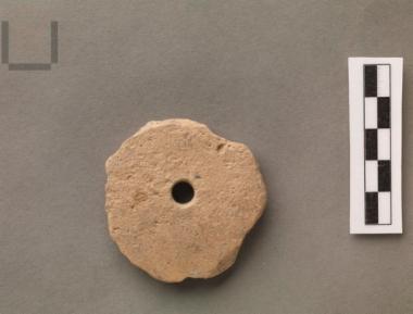 Round perforated sherd disk