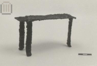 Iron model of a three-legged table
