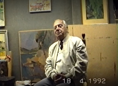 Kostas Loustas is painting Giorgos Stogiannidis