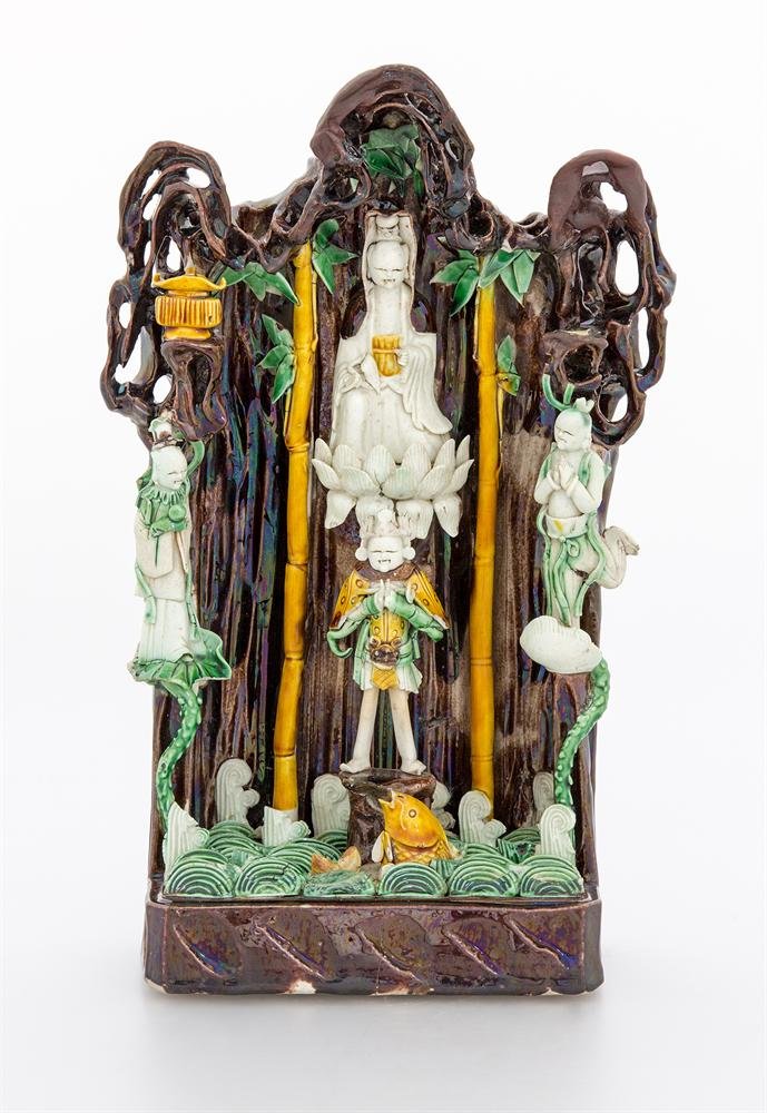 Figure of Guanyin, porcelain with moulded decoration and enamels