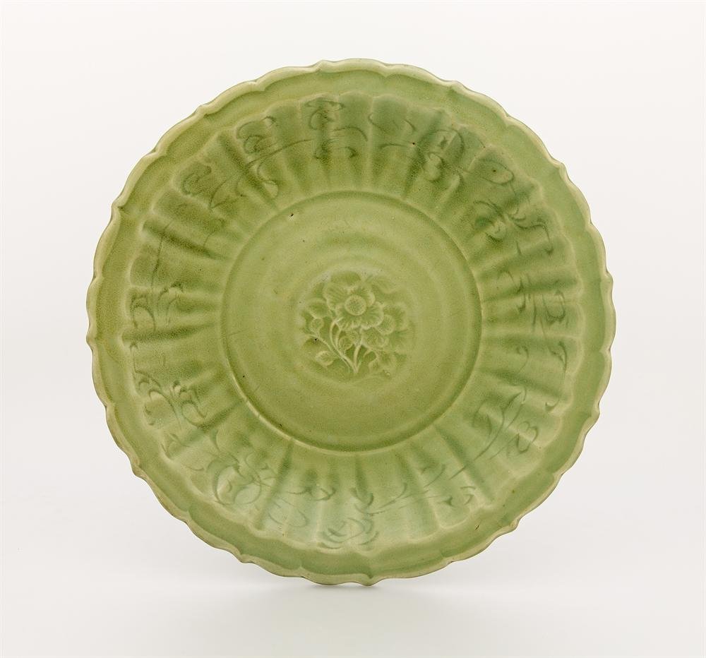 Dish of green Longquan stoneware with carved decoration