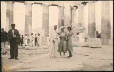 Three people posed inside the Parthenon