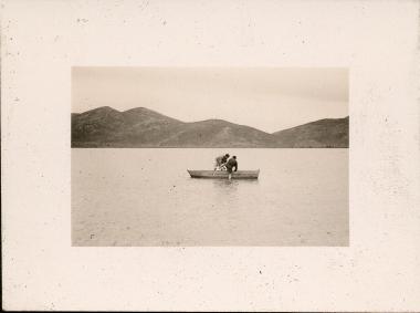 Euboea. Two men fishing from a small boat