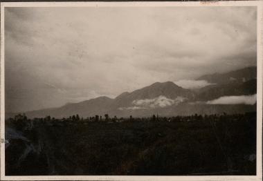 View to distant mountains with low clouds