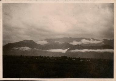 View to distant mountains with low clouds