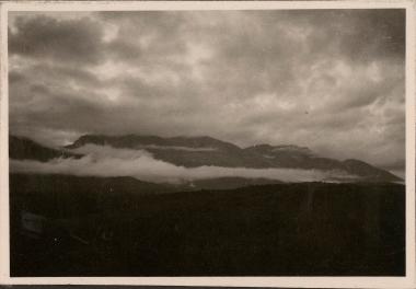 View to distant mountains with low clouds