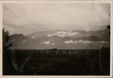 View to distant mountains with low clouds