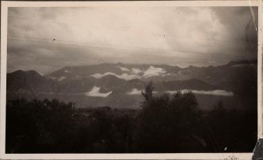 View to distant mountains with low clouds