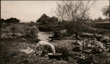 Messene. Woman washing in the river