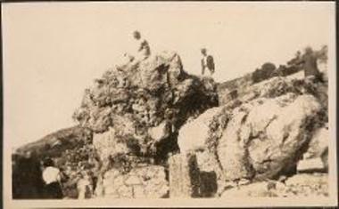 Delphi. People on top of rocks