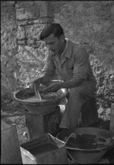 Pnyx Excavations. Christos washing pottery