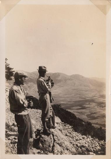 Corycian Cave. Men overlooking a valley