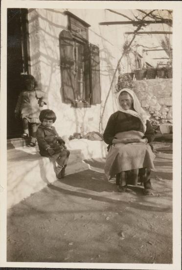 Skyros. Old woman with children