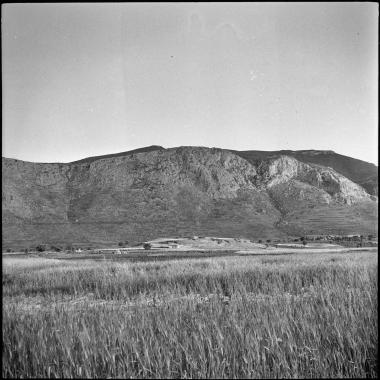Corinthia. Site in distance with mountain behind