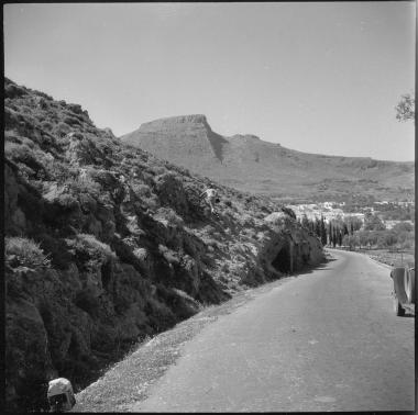 Rhodes. Road with mountain in distance