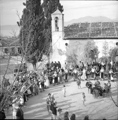 Kalamos. Village square, women dancing
