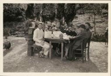 Martin H. Johnson, Lillian Libman, Richard H. Howland, Mao Te Lo, Mr. and Mrs. Means at lunch in Nemea.