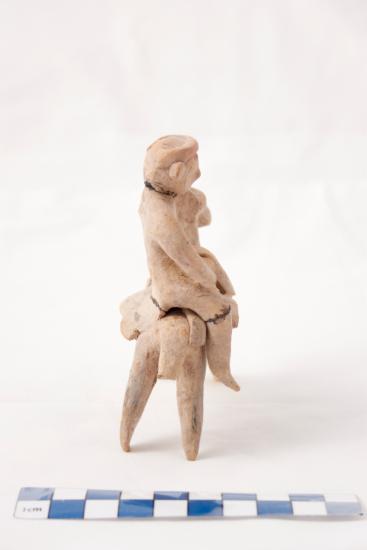 Clay figurine of a female figure on horseback