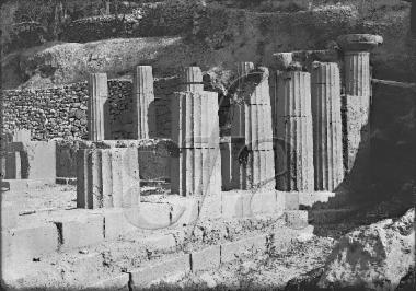 The poros temple of Athena Pronaia before the fall of the rocks.