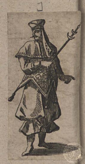 Άνδρας πολυτελώς ενδεδυμένος με κάλυμμα κεφαλής και ράβδο στο χέρι.