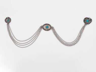 PIECE OF JEWELLERY WITH CHAIN, PART OF THE TRADITIONAL COSTUME OF ALEXANDREIA WITH A BLUE SAYIAS