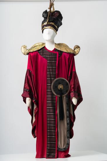 Ανδρικό φόρεμα τουνίκ, μεσάτο ασύμμετρο, με μπέρτα από τρεβίρα και σαντούκ