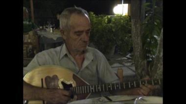 Samos Island (Pythagoreio), 2006: Thrasyvoulos Spahis playing the bouzouki