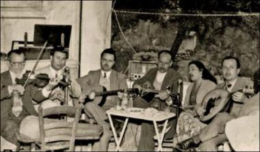 Chios Island (Kardamyla), 1950s: Religious feast in a kafeneio (local traditional cafeteria)