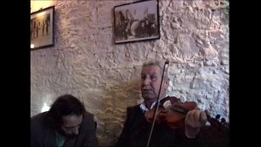 Lesbos Island (Mytilene), 1997: Nikos Paralis playing the violin and singing an amanes