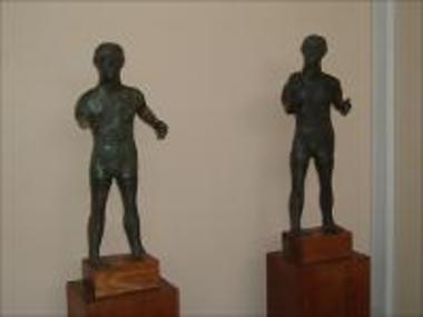Bronze statuettes of adolescents