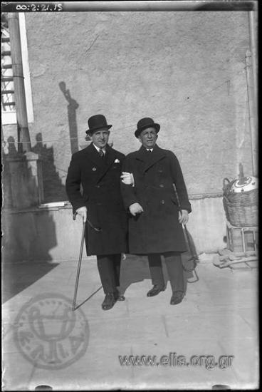 G. Vafiadakis and a strange man on a roof top