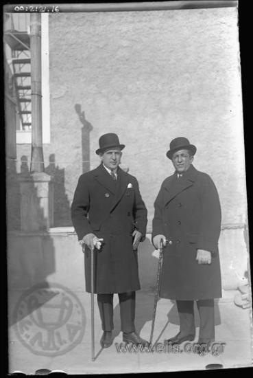 G. Vafiadakis and a strange man on a roof top