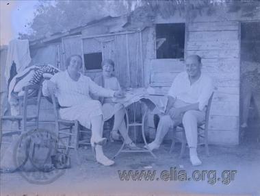 Excursion of the Travel Club. Iris and two friends resting by a hut