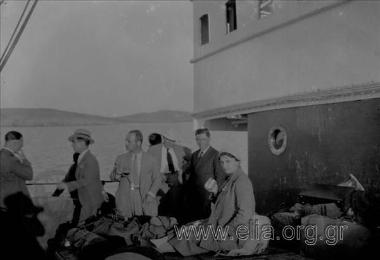 A group of friends aboard a ship.