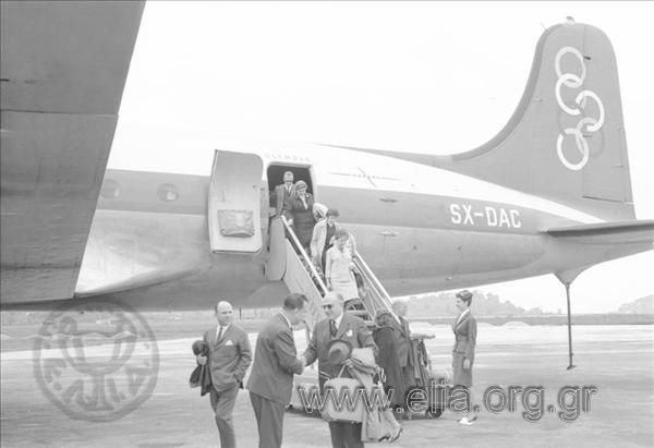 Easter in Corfu. Passengers disembark from the Olympic Airways plane.