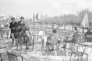 The Vafiadakis family. From the left standing, Semira Vafiadaki, Pantelis Vafiadakis, Erietta Fanouraki sitting with little Nikos Fanourakis in her arms, Lilli Fanouraki, née Vafiadaki, with her back turned.