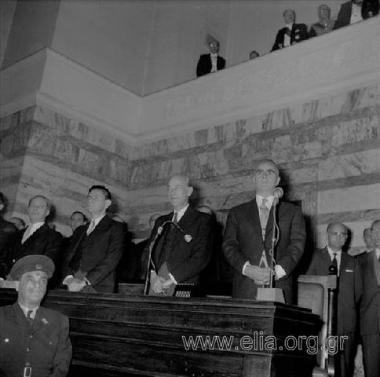 The swearing-in of K. Karamanlis' cabinet: the Prime Minister  flanked by Panagiotis Kanellopoulos and Panagis Papaligouras