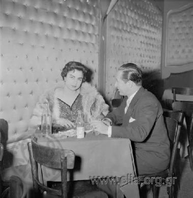 Minister of Education and Religious Affairs Georgios Voyiatzis and Miss Perroti at Athinais nigtht club