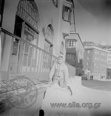 Filippos Niarchos(?) in a street of the city