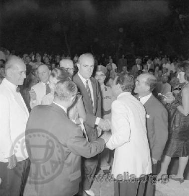 Konstantinos Karamanlis arriving at the ancient theatre to attend the performance of Luigi Cherubini's Medea, starring Maria Kallas