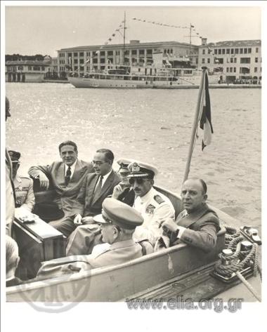 Georgios Rallis among other people on a craft