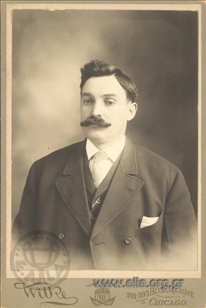 Portrait of a young man with a mustache