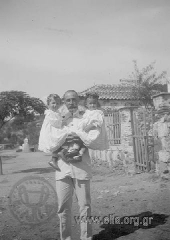 K. Melas with infants Irini N. Makka and Leontas Melas