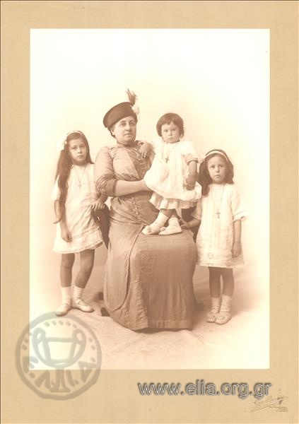 Aikaterini Gr. Zlatanou with her grandchildren, Eleni, Alexandra and Grigorios N. Makkas.