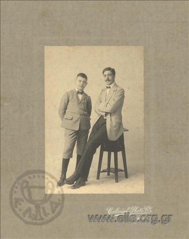 The portrait of a boy and a man.