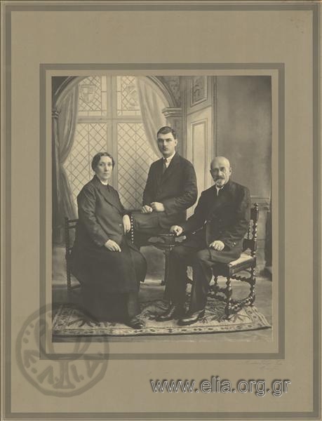 Kosmas Theocharatos with his wife and son